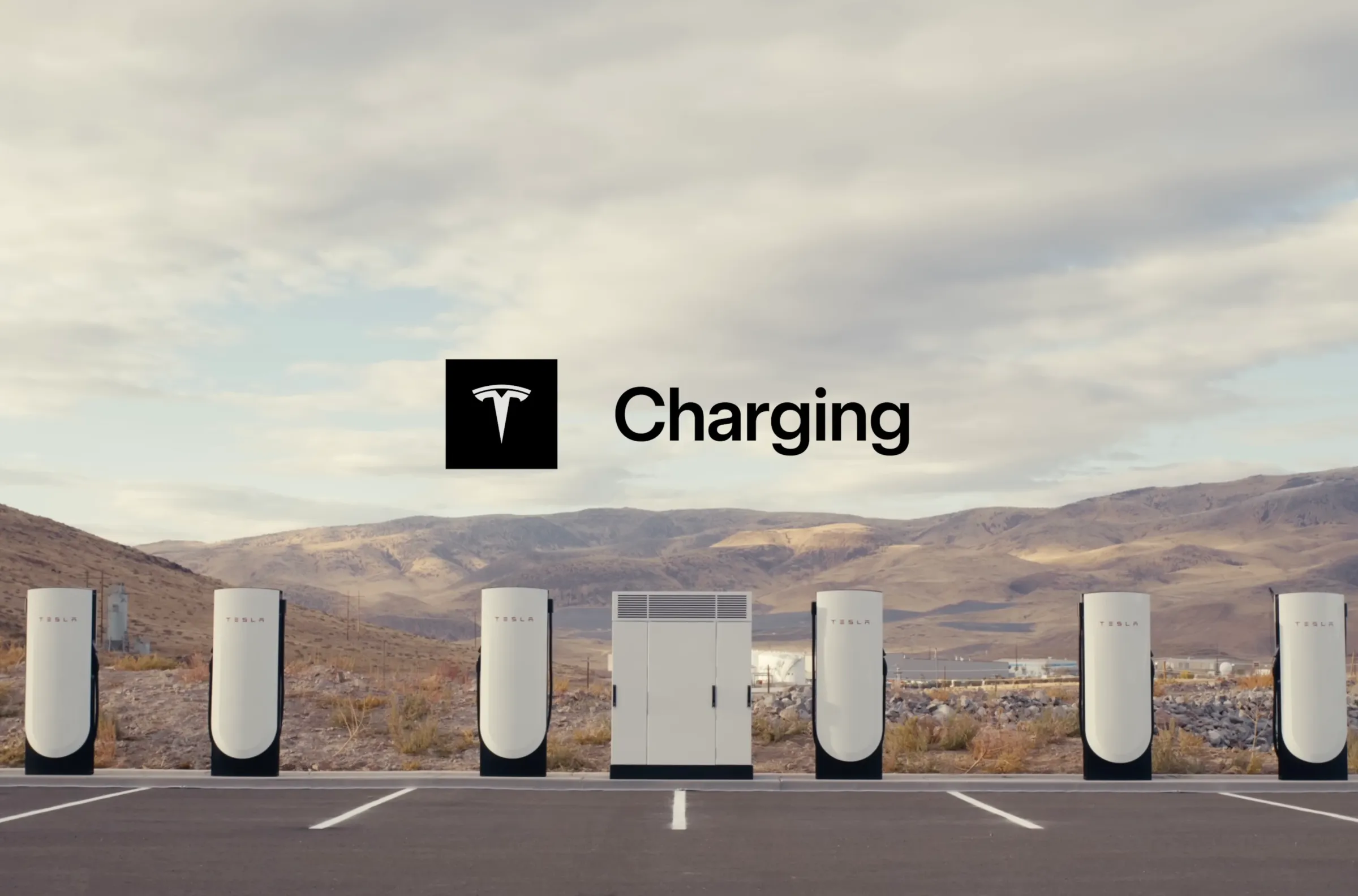 Tesla Supercharger stations in a desert landscape